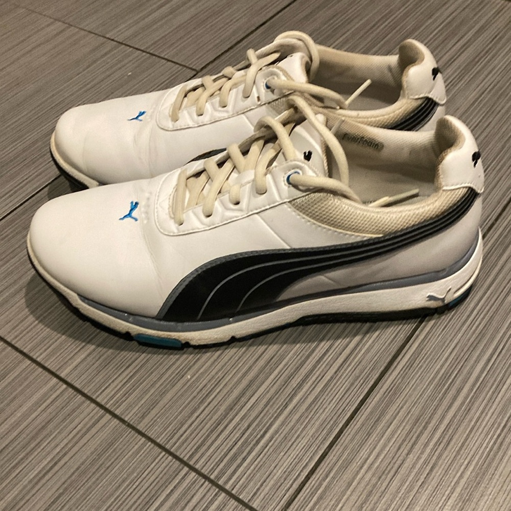 Men’s Puma golf shoes size 8.